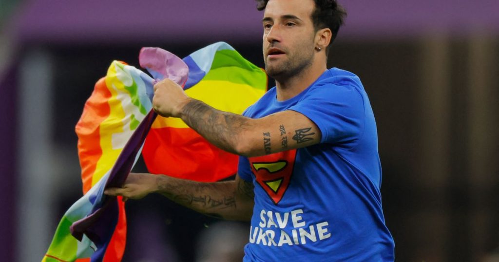 Spectator With Rainbow Flag Runs Onto Pitch At World Cup In Qatar