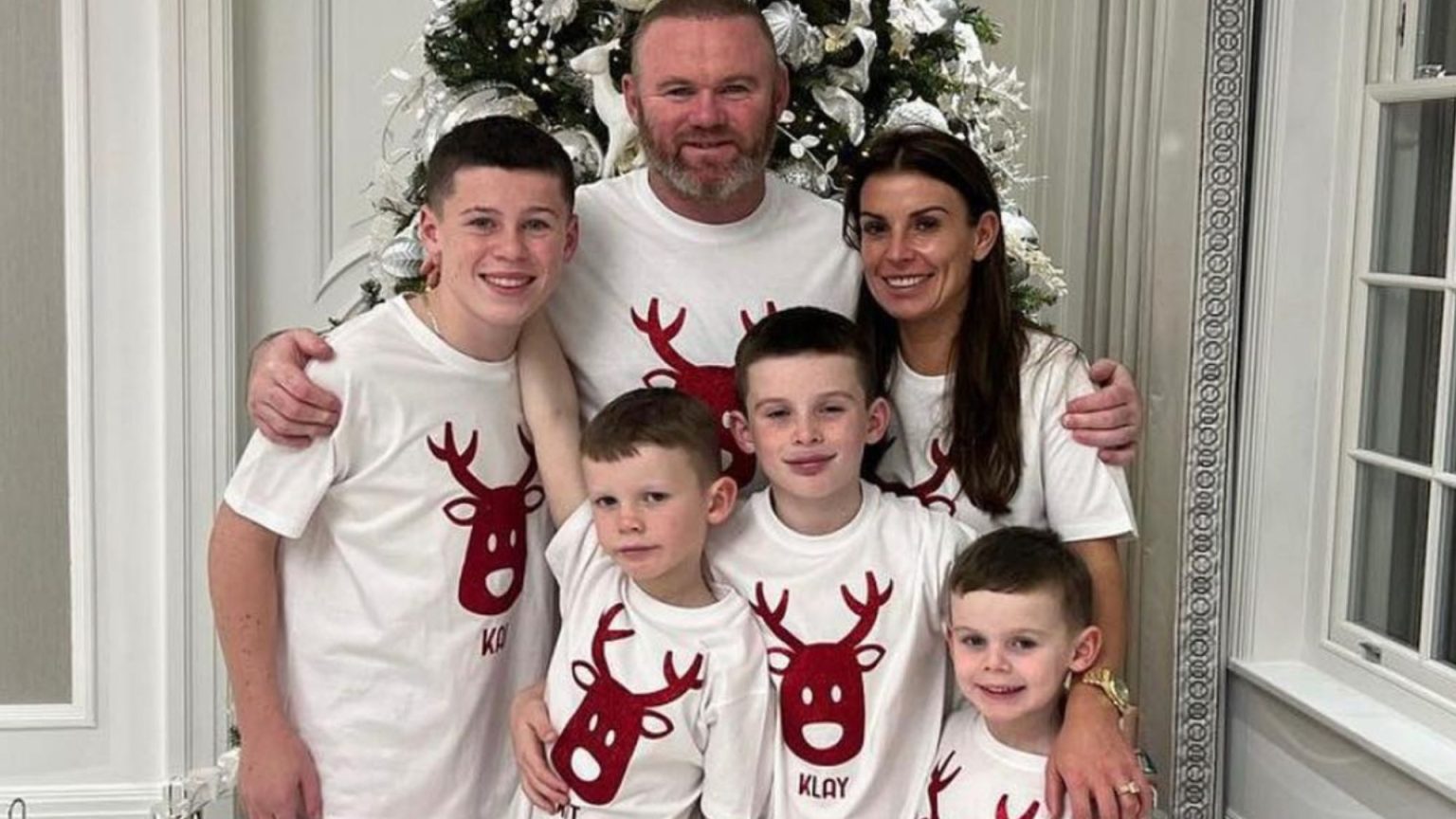Coleen and Wayne Rooney pose with four lookalike sons for festive snap wearing matching pyjamas