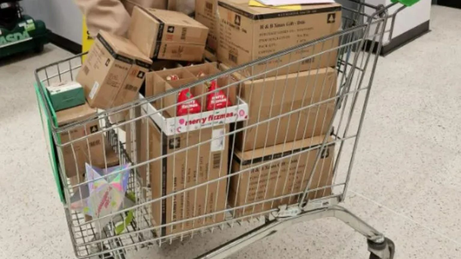 Woman carries 20p toiletry gift sets from Asda in her trolley. But people have the same two comments Woman piles trolley high with cut price 20p toiletry gift sets from Asda - but people all have the same two comments